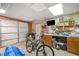Garage with bikes, kayak, and plenty of storage at 2311 Shoreline Pkwy, Villa Rica, GA 30180