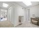 Basement hallway with access to multiple rooms and a water fountain at 2311 Shoreline Pkwy, Villa Rica, GA 30180