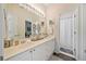 Bright bathroom with double vanity and shower at 2311 Shoreline Pkwy, Villa Rica, GA 30180