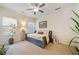 Spacious bedroom with ceiling fan and comfy daybed at 2311 Shoreline Pkwy, Villa Rica, GA 30180