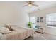 Bright bedroom with ceiling fan and ample natural light at 2311 Shoreline Pkwy, Villa Rica, GA 30180