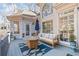 Spacious deck with outdoor furniture and lovely wooded views at 2311 Shoreline Pkwy, Villa Rica, GA 30180