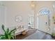 Spacious entryway with hardwood floors and a bench at 2311 Shoreline Pkwy, Villa Rica, GA 30180