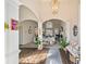 Bright and airy foyer with hardwood floors and view to living room at 2311 Shoreline Pkwy, Villa Rica, GA 30180