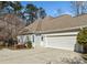 Attached two car garage with a separate side entrance at 2311 Shoreline Pkwy, Villa Rica, GA 30180