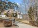 House with stone accents and a long driveway at 2311 Shoreline Pkwy, Villa Rica, GA 30180