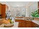 Kitchen with island, double sink, and view into breakfast nook at 2311 Shoreline Pkwy, Villa Rica, GA 30180