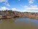 Aerial view of a serene lake surrounded by trees at 2311 Shoreline Pkwy, Villa Rica, GA 30180