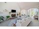 Spacious living room with vaulted ceilings, fireplace and large windows at 2311 Shoreline Pkwy, Villa Rica, GA 30180