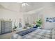 Main bedroom with large windows and access to deck at 2311 Shoreline Pkwy, Villa Rica, GA 30180