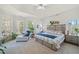 Spacious main bedroom with ample natural light and seating area at 2311 Shoreline Pkwy, Villa Rica, GA 30180