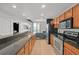 Modern kitchen with stainless steel appliances and granite countertops at 3040 Peachtree Rd # 614, Atlanta, GA 30305