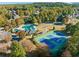 Overhead view of community amenities including the pool, tennis courts, and playground at 1105 River Laurel Dr, Suwanee, GA 30024