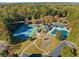 Community amenities showcase pool, tennis courts, and a playground nestled in a serene setting at 1105 River Laurel Dr, Suwanee, GA 30024