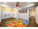 Finished basement featuring fun decor and laminate flooring throughout at 1105 River Laurel Dr, Suwanee, GA 30024