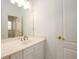 Bathroom with white cabinets, toilet, bathtub, shower and large mirror at 1105 River Laurel Dr, Suwanee, GA 30024