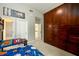 Cozy bedroom featuring a large wardrobe, carpeted floors, and a view of the hallway at 1105 River Laurel Dr, Suwanee, GA 30024