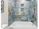 Spa-like bathroom with a blue marble shower and modern fixtures at 1464 Sanden Ferry Dr, Decatur, GA 30033