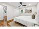 Bright bedroom with hardwood floors and a ceiling fan at 1464 Sanden Ferry Dr, Decatur, GA 30033