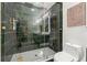 Modern shower with frameless glass enclosure and rainfall shower head at 1464 Sanden Ferry Dr, Decatur, GA 30033