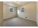 Simple bedroom with neutral wall paint and carpet at 24 Valerie Ln, Powder Springs, GA 30127