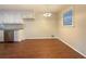 Spacious dining area with hardwood floors and neutral walls at 24 Valerie Ln, Powder Springs, GA 30127