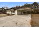 House exterior showcasing carport and driveway at 24 Valerie Ln, Powder Springs, GA 30127
