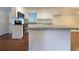 Modern kitchen featuring granite countertops and stainless steel appliances at 24 Valerie Ln, Powder Springs, GA 30127