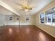 Bright living room with hardwood floors and large windows at 24 Valerie Ln, Powder Springs, GA 30127