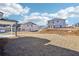 Large backyard with neighboring homes at 1569 High Falls Ln, Grayson, GA 30017