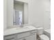 Clean bathroom featuring a vanity with a quartz countertop at 1569 High Falls Ln, Grayson, GA 30017