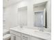 Bright bathroom with double vanity and shower at 1569 High Falls Ln, Grayson, GA 30017