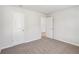 Bedroom with neutral walls, carpet, and a window at 1569 High Falls Ln, Grayson, GA 30017