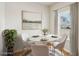 Bright dining area with a round table and four chairs, perfect for Gathering meals at 1569 High Falls Ln, Grayson, GA 30017