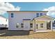 Home's exterior with covered patio at 1569 High Falls Ln, Grayson, GA 30017