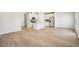 View of kitchen with island and adjacent dining area at 1569 High Falls Ln, Grayson, GA 30017