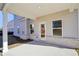 Covered patio with access to backyard at 1569 High Falls Ln, Grayson, GA 30017