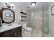 Clean bathroom featuring a glass shower, toilet, and modern sink, offering a functional space for daily use at 37 Highcrest Dr, Acworth, GA 30101
