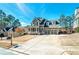 Inviting two-story home with a well-manicured lawn and a spacious driveway leading to a two-car garage at 37 Highcrest Dr, Acworth, GA 30101