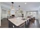 Modern kitchen featuring a granite island, stainless steel appliances, and an open layout at 37 Highcrest Dr, Acworth, GA 30101