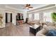 Inviting living room features stylish furniture and a large TV, creating a cozy atmosphere at 37 Highcrest Dr, Acworth, GA 30101