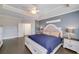 Serene main bedroom with tray ceilings, a king bed, and ensuite bathroom access at 37 Highcrest Dr, Acworth, GA 30101