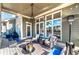 Relaxing outdoor patio area with comfortable seating and elegant chandelier is great for entertaining guests at 37 Highcrest Dr, Acworth, GA 30101
