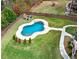 Aerial view of a backyard with an in-ground swimming pool and patio at 37 Highcrest Dr, Acworth, GA 30101