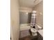 Bathroom with tiled shower, bathtub and toilet at 3321 Border Dr, Stone Mountain, GA 30087
