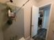 Standard bathroom showing a gray tile shower and an open doorway at 3321 Border Dr, Stone Mountain, GA 30087