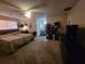 Spacious bedroom featuring fan and neutral paint at 3321 Border Dr, Stone Mountain, GA 30087