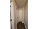 Hallway with wood floors and white doors at 3321 Border Dr, Stone Mountain, GA 30087
