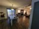 Open-concept living room with hardwood floors, fireplace, and natural light at 3321 Border Dr, Stone Mountain, GA 30087