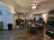 Spacious living room featuring vaulted ceilings, fireplace and abundant natural light at 3321 Border Dr, Stone Mountain, GA 30087